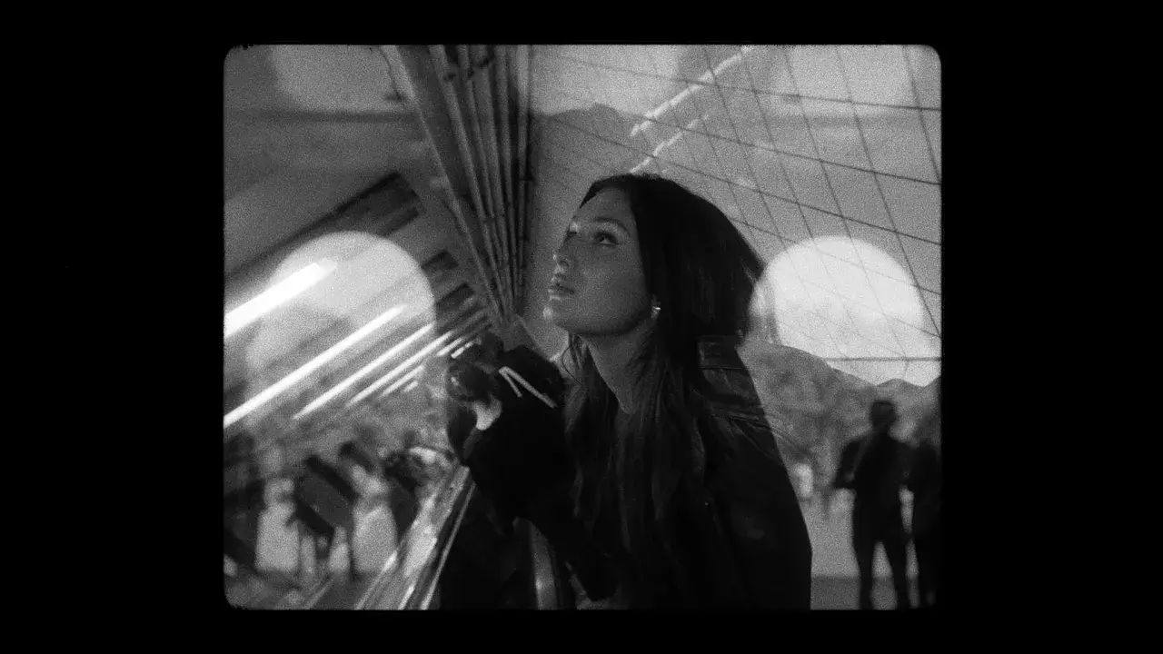 From the Traffic music video: maryjo looks into the sky.